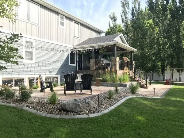 Side view of patio project with small deck