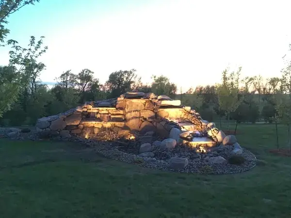 Layered rock water feature with lights photo