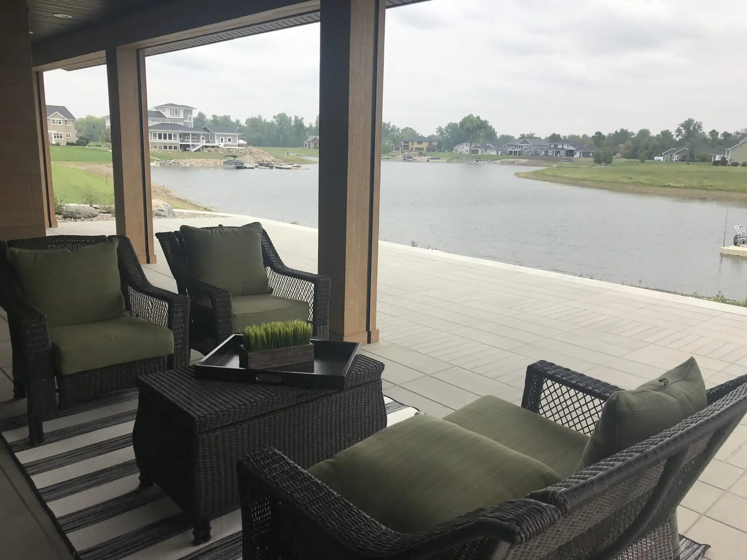 Backyard patio with a lake view